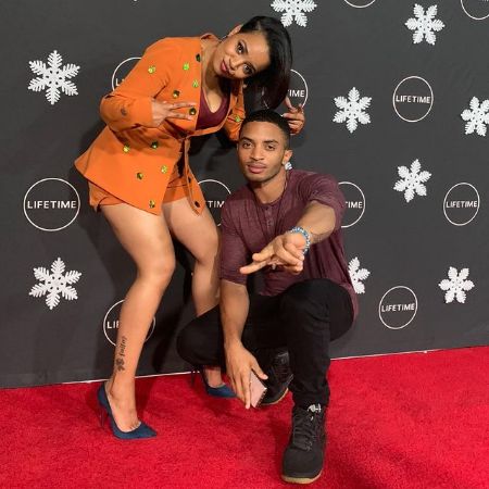 Doheen Pratt and Kyla Pratt is posing for a photo.